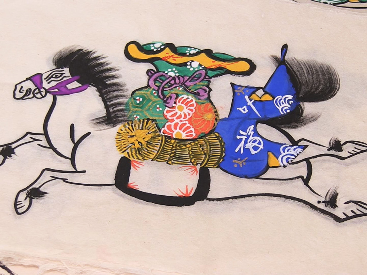 飛騨高山の夏の風物詩「松倉絵馬市」に向け、縁起物の紙絵馬づくりが最盛期を迎えてい...